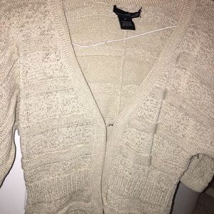 Tan sweater size: medium